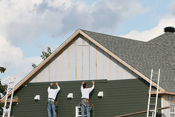 Professional Siding Contractor technician working in Rice, MN